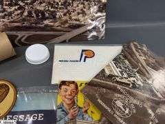 Mixed Lot of Memorabilia to Include a 1949 National Basketball Assn. Indianapolis Olympians, Inc. Butler Fieldhouse Ticket,  a Kingan's Packing Houses, Indpls., IN Boiled Ham Blotter, Motor Data Calclator, Moon Pie and 50th Anniversary of Nascar Sticker, Welcome to Truck & Bus Indpls. Manufacturing Brochures, Louis Marx & Co. American Presidents in Miniature Brochure, an Indianapolis Pacers SEALED Envelope Dated Nov. 20, '67, An Areal Photo of Indianapolis and a Metal Tin Jack Daniels with 2 Shot Glasses