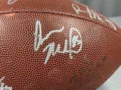 Wilson NFL Official Size Autographed Football.  Autographed include Reggie Wayne, Dallas Clark, Robert Mathis and Others.