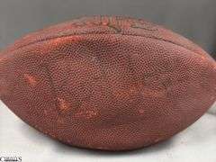 3 Footballs- One Blue NAPA Auto Parts and 2 Wilson National Football League.  One Wilson has autographed but they are fading and can not be read.  The other Wilson ball is in a display case.