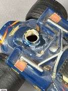 #2 Johnny Lightning Porcelain Lionstone Decanter Autographed by Al Unser and Parnelli Jones.  EMPTY