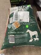 Opened and Taped Bag of Horse Feed