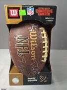 Wilson NFL Official Size Autographed Football.  Autographed include Reggie Wayne, Dallas Clark, Robert Mathis and Others.