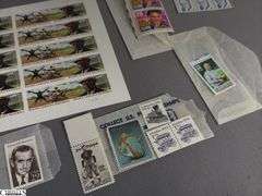 Collectible Stamps.  Includes Major League Baseball All-Stars, Negro Leagues Baseball, Indianapolis 500 Legends of Baseball, Sunday Funnies, Baseballs Legendary Playing Field, Knute Rockne 22 Cent Stamp, Lou Gehrig Cent Stamp and a Few Others