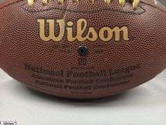 Wilson NFL Official Size Autographed Football.  Autographed include Reggie Wayne, Dallas Clark, Robert Mathis and Others.