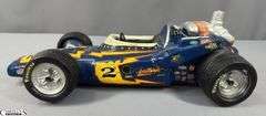 #2 Johnny Lightning Porcelain Lionstone Decanter Autographed by Al Unser and Parnelli Jones.  EMPTY