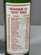Indianapolis Memorial Day Classic 1967 Turbine-Powered Parnelli Jones Autographed Glass and a 7 UP Souvenir Bottle 500 Mile Race May 27, 1979 Autographed