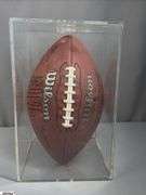3 Footballs- One Blue NAPA Auto Parts and 2 Wilson National Football League.  One Wilson has autographed but they are fading and can not be read.  The other Wilson ball is in a display case.