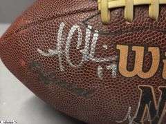 Wilson NFL Official Size Autographed Football.  Autographed include Reggie Wayne, Dallas Clark, Robert Mathis and Others.