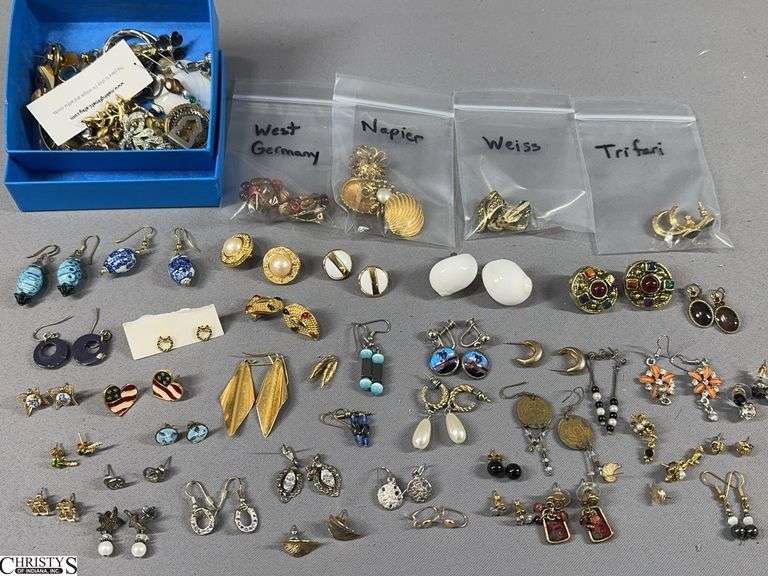 1 Pair of Weiss Earrings, 1 Pair of Trifari Earrings, 1 Pair of Earrings Marked West Germany, 2 Pairs of Napier Earring, 40 More Pairs of Earring and a Box of Single Earrings image