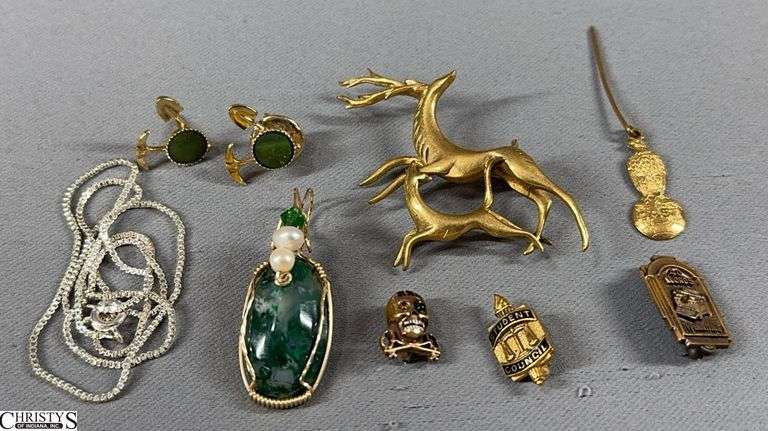 7 Pins, 1 Jade Pendant and a Silver Color Chain.  2 Jade Pick & Shovel Pins, a Case Tractor Stick Pin, Student Council Pin, 40 Words Typewriting Pin, Scull & Crossbones Pin and a Deer Pin Marked Germany image