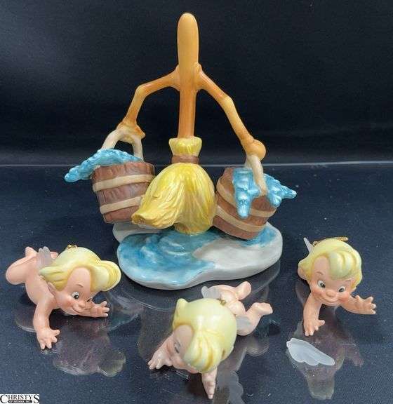 Walt Disney Classics Collection from Fantasia is the Broom "Bucket Brigade" and 3 Cupid "Flight of Fancy" Sculptures in Box with Certificate of Authenticity. One of the Cud Figures has a broken wing however the wing is included. image