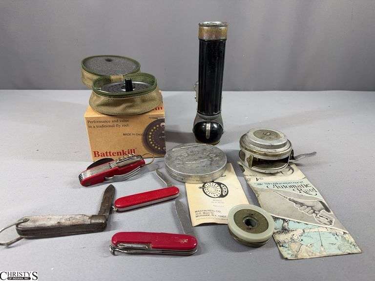 Fly Reels, 3 Pockets Knives, 1 Multi-Tool and a Swivel Head Flashlight image