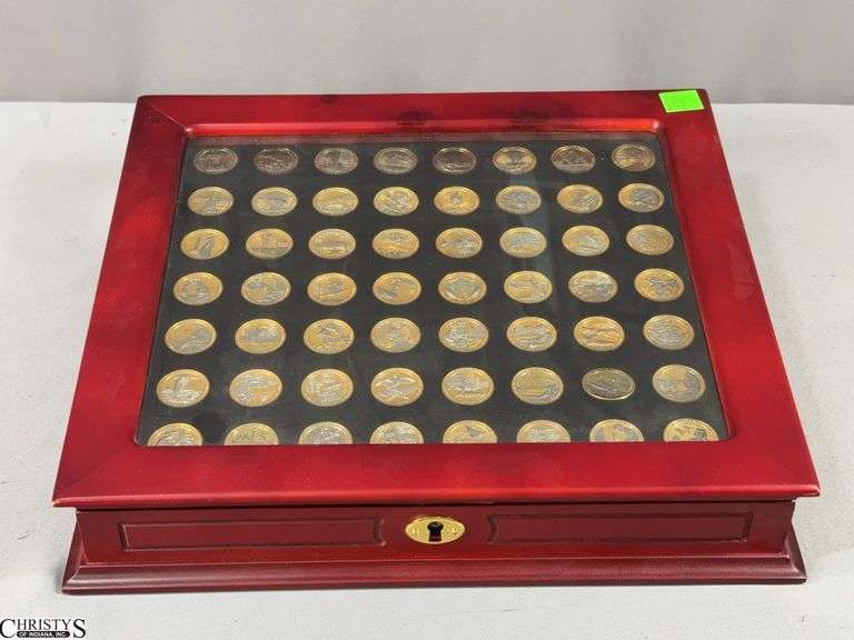 America The Beautiful Quarters Collection with 56 Coins.  The coins are gold and silver in color and in a Glass Top Display Box with Key image