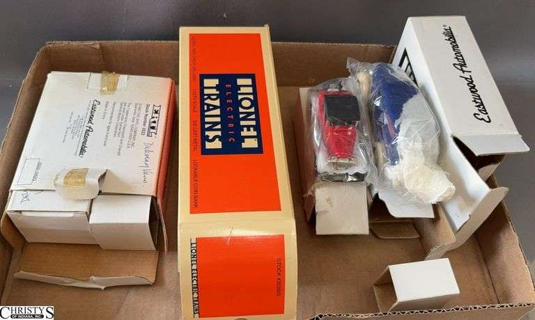 3 Boxes With 5 Total Lionel Autos, Eastwood Automobiles 1955 Chevy Delivery, and Other Delivery Vans image