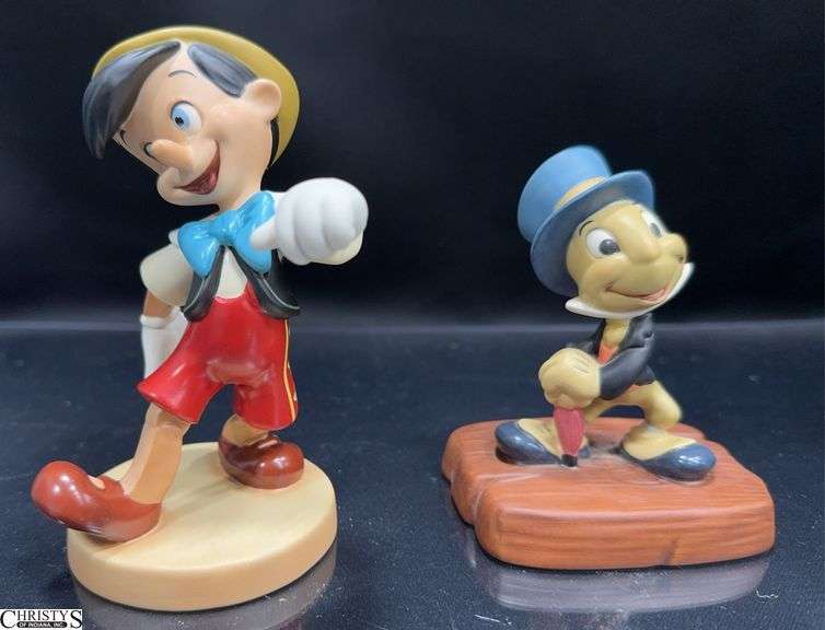 2 Walt Disney Classics Collection Pinocchio Sculptures in Box with Certificate of Authenticity. Incudes Pinocchio "Look Out, World" and Jiminy Cricket "Cricket's the name- Jiminy Cricket!" image