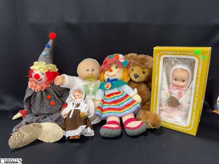 Various Dolls and Stuffed Animals.  Includes a Effanbee Doll in Box Tiny Tubber, Vogue Doll Ginnny, a Cabbage Patch Type Doll, Stuffed Bear Dimples, a Cloth Doll and a Clown image