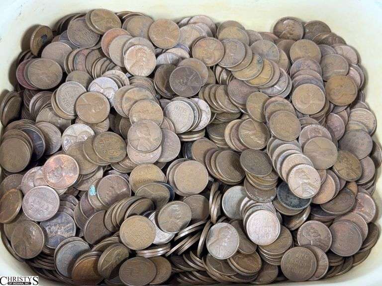 A Loose Penny Collection.  I see mostly wheat pennies.   The pennies weigh 3457 grams (about 7.62 lbs.) image