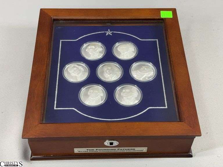 The Founding Fathers Silver Proof Commemoratives Collection in Glass Top Display Box.  Includes Seven 1 Troy O. .999 Fine Curved Silver Bullion Pieces image