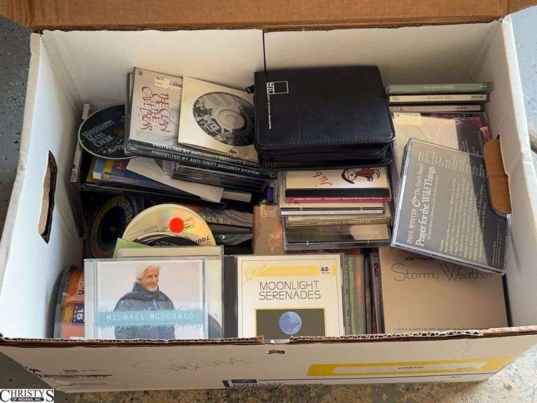 Box of CDs Sone Blank Some Empty Cases image