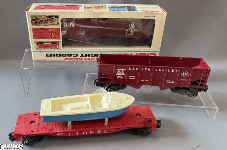 3 Lionel Train Cars, Lehigh Valley Hopper 25000, Boat Transport Car 6801 With Boat, and Monon Boxcar 9230 image