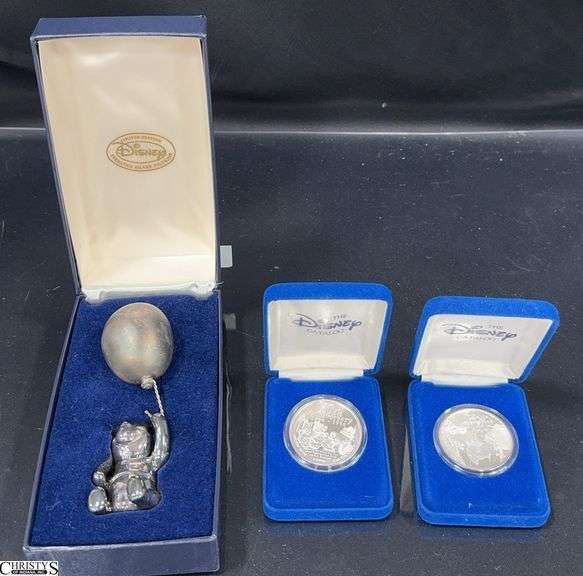 Disney Limited Edition Pooh Sterling Silver Figurine in Box and 2 One Troy Ounce .999 Fine Silver Winnie The Pooh Coins in Blue Velvet Displays image