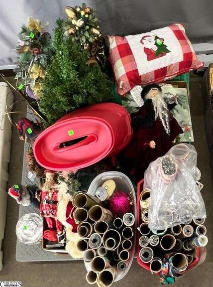 Skid With Under Bed Storage With Holiday Wrapping Paper, Small Tree, Planters with Artificial Topiaries image