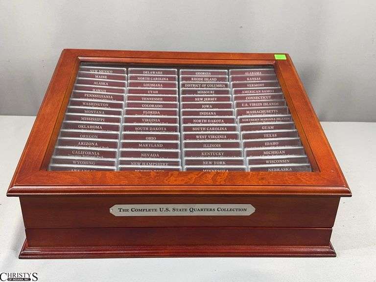 The Complete U.S. State Quarters 56 Piece Collection Set in Display Box with Glass Top.  Set includes 56 3-Piece State Quarter Coin Sets.  17 1/2" X 15" X 7" image
