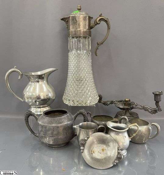 Silver Plate and Glass Pitcher, Pewter Pitchers, Cream and sugar, Cups, Damaged Candle Holder image