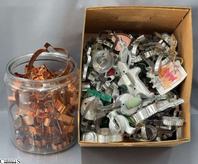 Large Canister With Copper and Other Cookie Cutters image