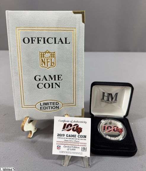 2 NFL Official Game Coins- Super Bowl XLII Silverplate with 24Kt Gold Highlights, COA and Official Game Coin Velvet Display & a Chicago Bears 2019 Game Coin 39mm Silver Plated with Certificate of Authenticity  in Black Velvet Holder.  Contains a replica of the coin used for the coin toss.  Limited Edition of 5,000 The Highland Mint. image