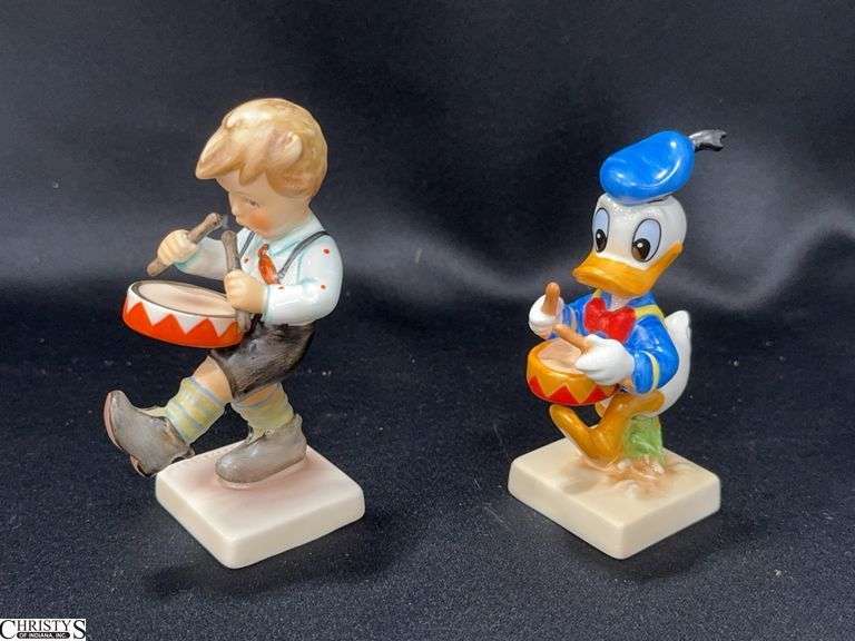 2 Goebel Figurines.  1993 Limited Edition Donald Duck Drummer with COA #573/1500 and a Goebel Little Drummer Boy image