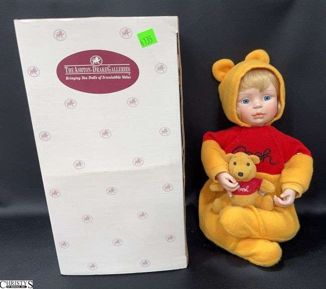 Ashton-Drake Galleries Porcelain Doll "You Need a Hug, Pooh" from the It's So Much Friendlier With Pooh Collection.  This doll is in the box with a Certificate of Authenticity. image
