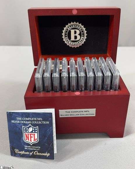 10 Piece NFL Silver Dollar Collection in Wooden Box.  Contains 10 2015 NFL BU Silver Dollars with Each Team's Logo in Official Team Color Plus It's Name and Year Established- Steelers, Cowboys, Packers, 49ers, Ravens, Bears, Colts, Saints, Raiders and Eagles. image