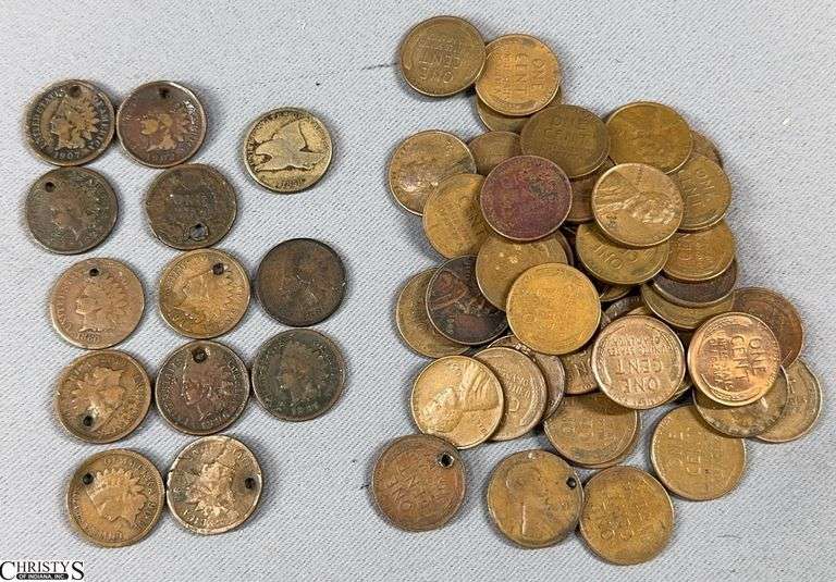 63 One Cent Coins.  Includes 1858 Flying Eagle Cent, 12 Indian Head Pennies (10 are holed) and 50 Wheat Pennies (2 are holed) image