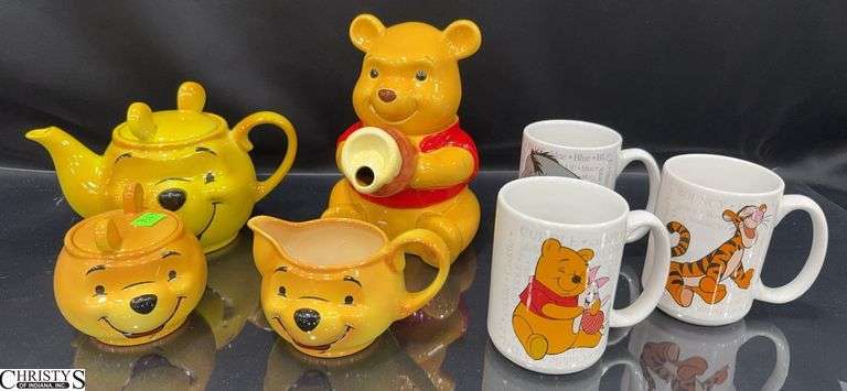 Winnie The Pooh Teapot, Cream& Sugar from the Disney Showcase Collection,  A Pooh Teapot Marked Disney Mexico and 3 Disney Pooh Mugs (Bouncy, Blue and Cuddle) image