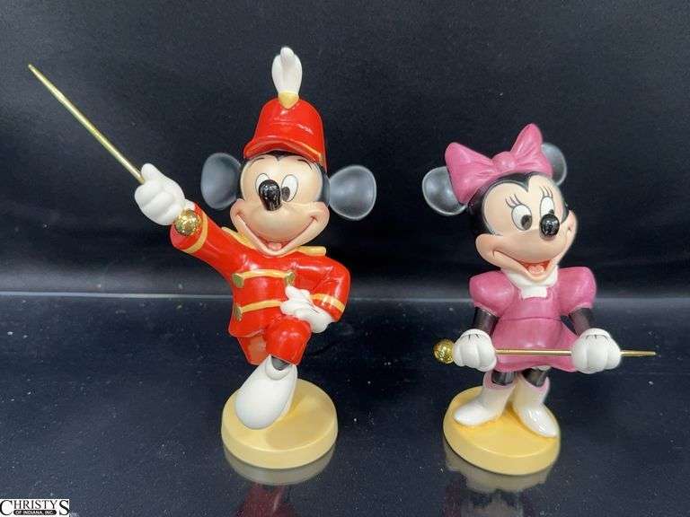 2 Walt Disney Classic Collection Mickey Mouse and Minnie Mouse Figures in Boxes with Certificate of Authenticity.  Includes Mickey Bandleader  "Strike Up the Band" and Minnie "Join the Parade" image