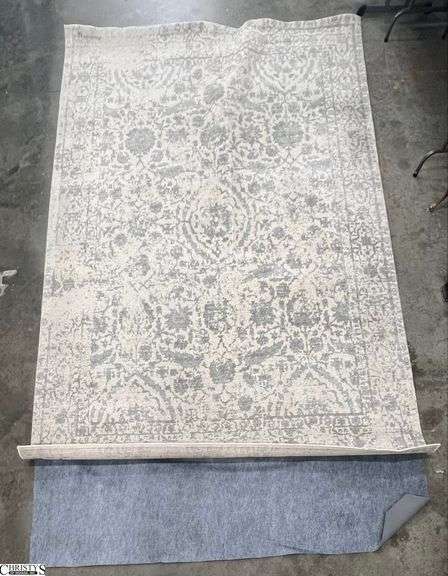 Oriental Weavers Area Rug - 102" x 144" - has small area of damage on trim edge image