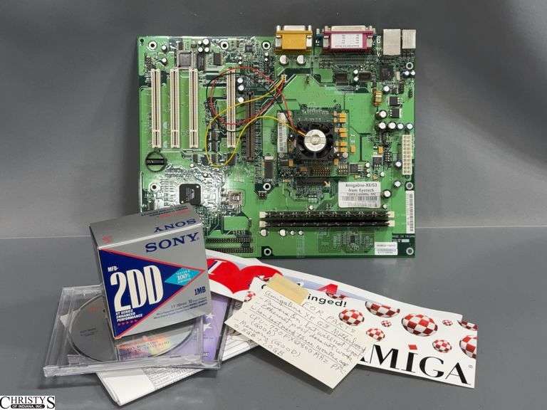 AmigaoneXE G3 Motherboard- FOR PARTS, 2 CD's Public Domain Software and 1 Box of Diskette p.d.  Software image