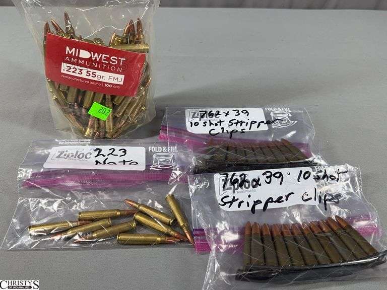 Miscellaneous Rifle Cartridges- Bag of 100 Midwest Ammunition .223 55gr FMJ, 8 Cartridges of .223 NATO and 4 10-Shot Stripper Clips of 7.62x39mm image