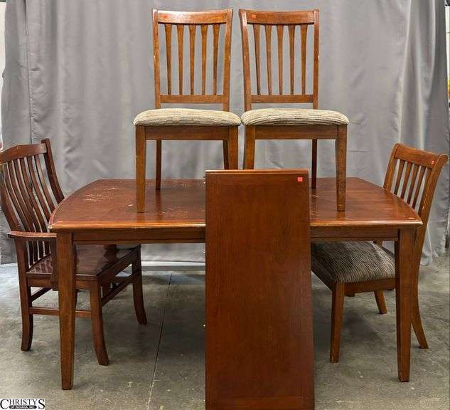 Wooden Dining Table and 4 Chairs, 1 Leaf - 70" x 40" x 30" - 18" of leaf - Table surface shows heavy wear image