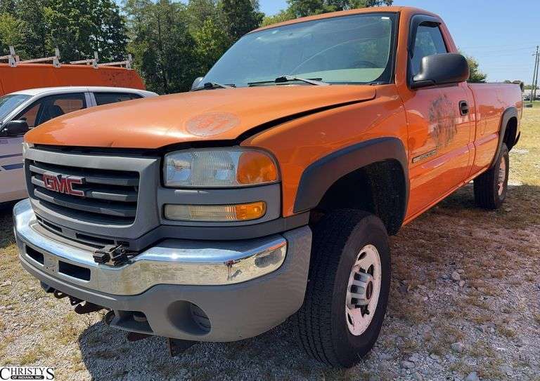 2005  GMC  Sierra Driven here runs rough engine light on weak battery image