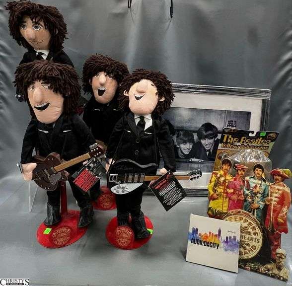 The Beatles 4-Piece Sgt. Pepper's Lonely Hearts Club Band 21" Figures with Stands by Applause Inc., a New in Package The Beatle Yellow Submarine with Posable Figure, 12" Cardboard Stand Up of the Beatles and a Framed Under Glass Beatles Photo Approx. 22" X 18" image