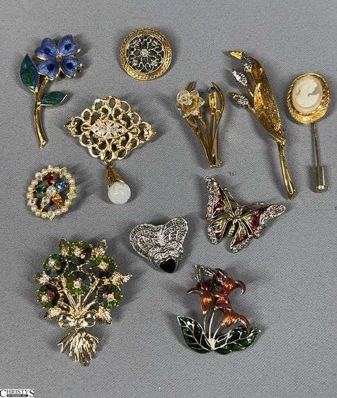 11 Fashion Pins.  One pin has the Swarovski Mark and One is a Stick Pin image