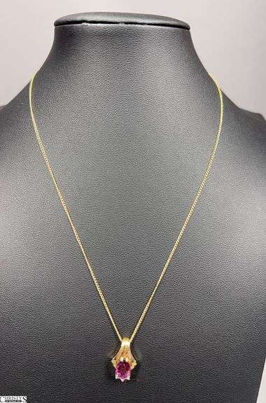 14KT Yellow Gold Pendant with a Pear Shaped Rhodolite Garnet and Three .01/100 RB Diamonds on a 16" Chain image
