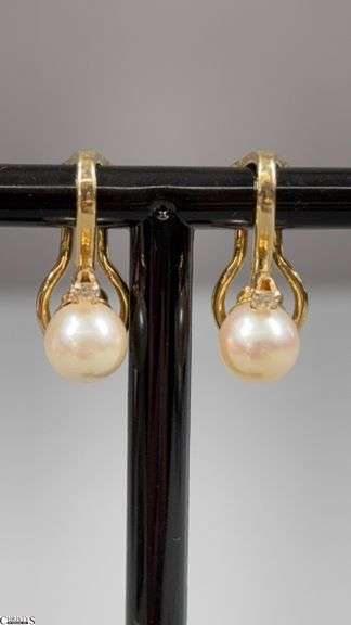 14KT Yellow Gold Clip On Earrings.  Each with 1 6mm Pearl and 1 .02/100 RB Diamond image