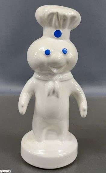 Pillsbury Dough Boy Ceramic Coin Bank and Assorted Pennies - 7.5" image