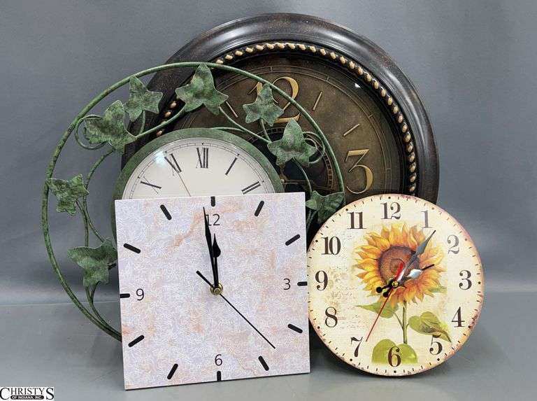 4 Wall Clocks - 15" D of largest image