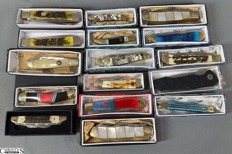 16 Pocket Knives in Boxes.  They look to be new. Brands Include Frost and Bear Hunter, image
