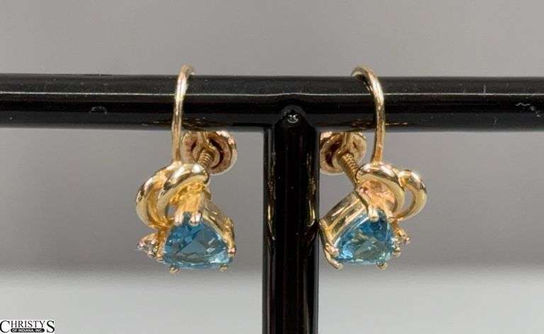 Pair of 14KT Yellow Gold Earrings with Each Containing 1 6x6x6mm Trillion Cut Blue Topaz and 1 Approx. .005/100 RB Diamond image