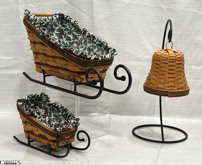 2 Holiday Sleigh Baskets with Wrought Iron Stands and a Longaberger Holiday Bell with Wrought Iron Stand image